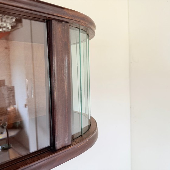 Image 1 of Subtle hanging display case with polished slats