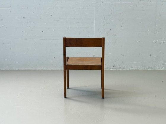 Image 1 of Set van 6 stapelbare houten stoelen in een minimalistisch design uit het midden van de vorige eeuw.