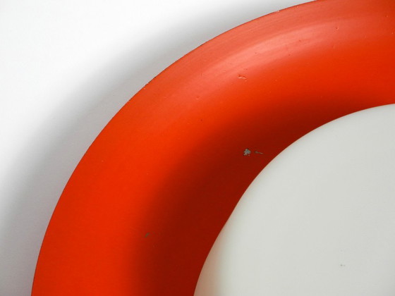 Image 1 of Grote Mid Century wand- of plafondlamp van glas met metalen reflector in rood van Kaiser Leuchten