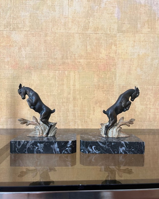 Image 1 of Fermalibri Art Déco vintage – Bronzo e marmo Portor – Francia, 1930