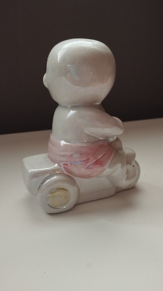 Image 1 of Mid-Century Lusterware Figurine – Baby on Tricycle – Davis & Freeman (Japan/USA)