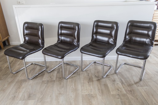 Ensemble de 4 chaises vintage à structure tubulaire - cuir skaï - style Space Age - années 1970