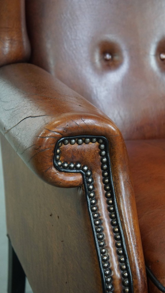 Image 1 of Grote vintage schapenleren oorfauteuil