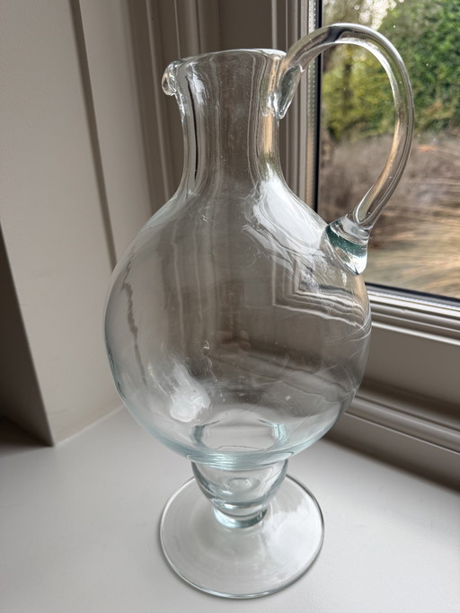 Tall glass jug/vase made of thick glass, classic model with ear
