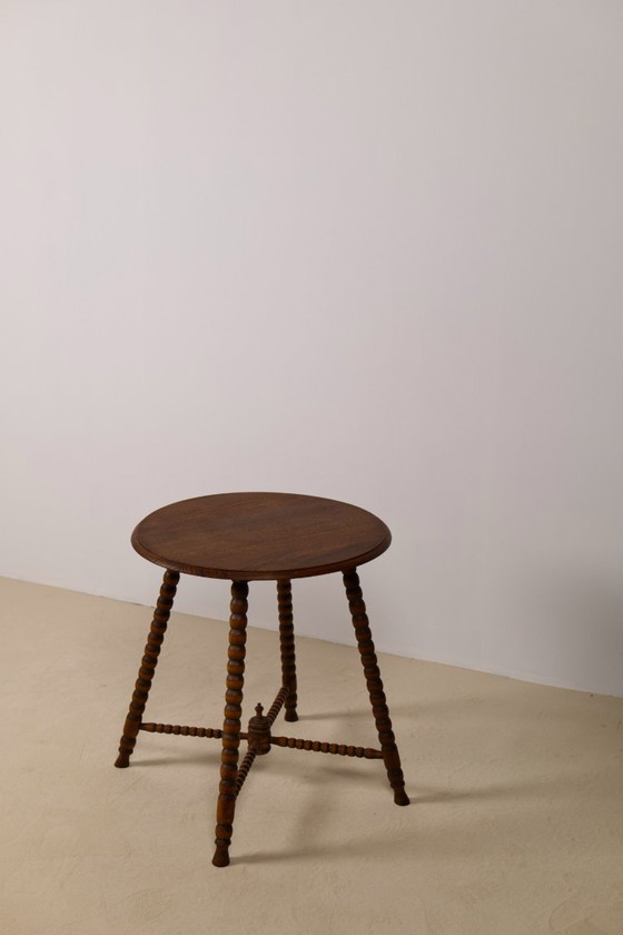 Image 1 of Vintage ronde bijzettafel met spoelmotief