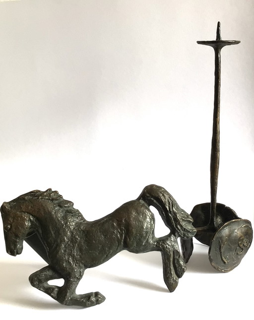 Bougeoir et poignée de porte en bronze