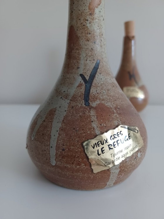 Image 1 of Set di due vasi da olio e aceto vintage, fatti a mano. In ceramica. Metà secolo.