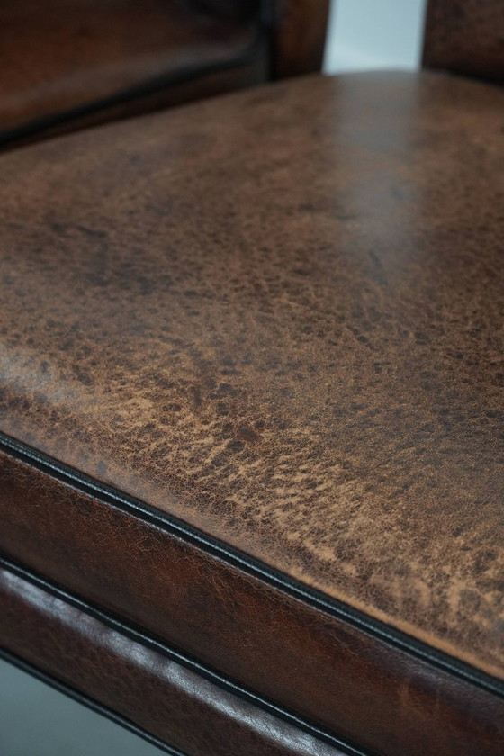 Image 1 of 4 chaises de salle à manger confortables en peau de mouton avec du caractère