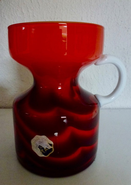 Vintage Murano vase in a wavy pattern with a white handle.