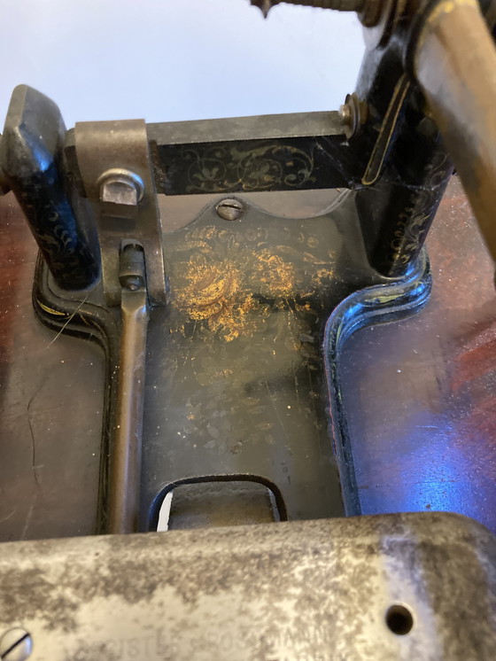 Image 1 of Antique step sewing machine from 1873