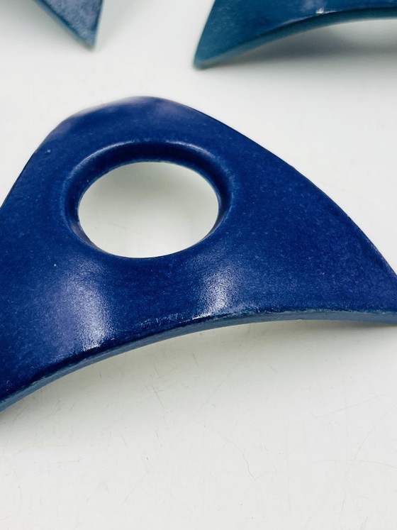 Image 1 of Set di 4 portauova in ceramica blu di design, marca Malice.