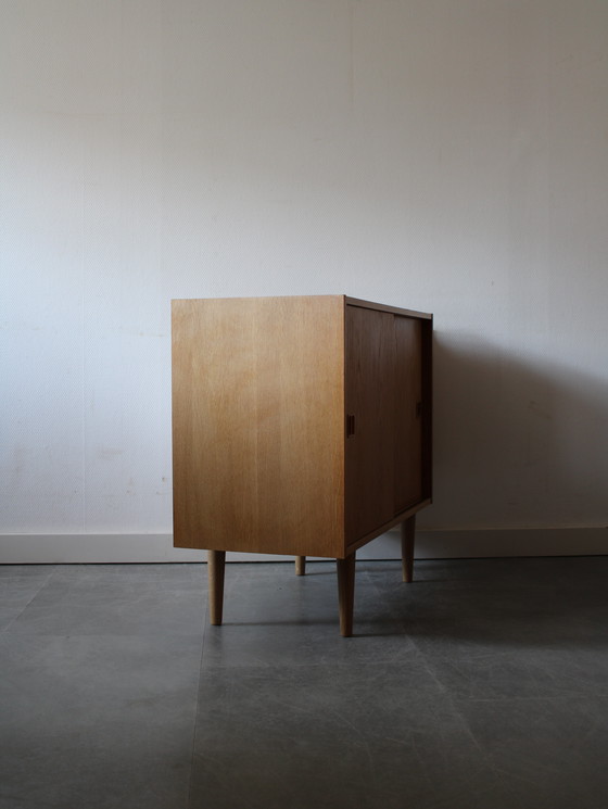 Image 1 of Vintage Danish sliding door cabinet in oak