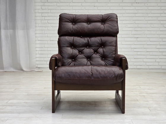 Image 1 of 1970, Scandinavische fauteuil met hoge rugleuning, bruin meubelleder, donker beukenhout.
