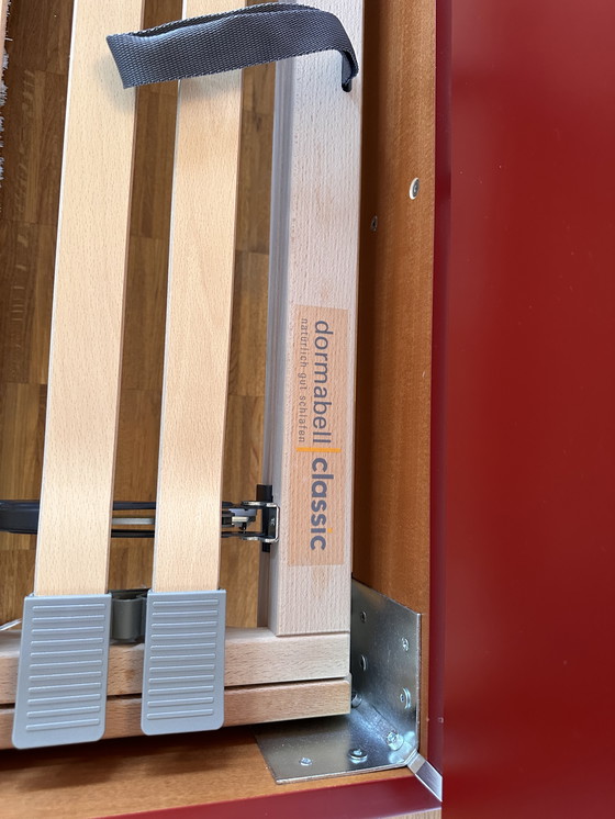 Image 1 of Letto 180 x 200 in legno massello con piedini in acciaio inox e rete a doghe.