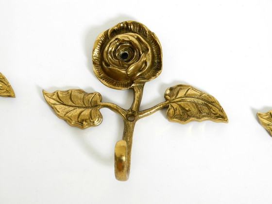 Image 1 of Set of five beautiful, solid mid-century brass rose wall coat hooks