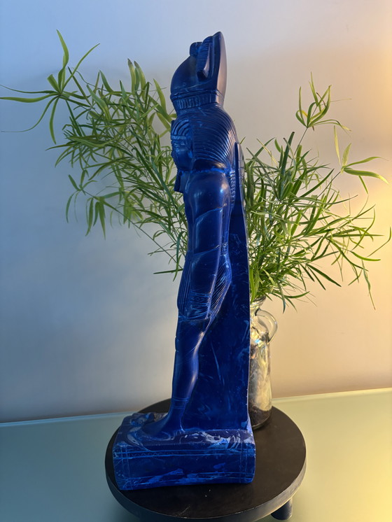 Image 1 of statue of the Egyptian god Thoth.