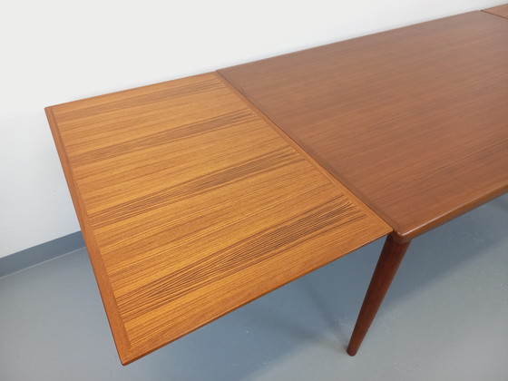 Image 1 of Scandinavian 60's vintage Dyrlund rectangular teak dining table with extensions