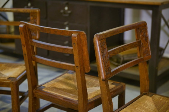 Image 1 of Set van 6 eikenhouten stoelen in de stijl van Pierre Cruège, jaren 1940.