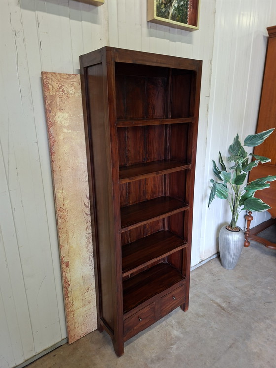 Image 1 of Donker teakhouten boekenkast afm. 96x29cm en 190cm hoog.