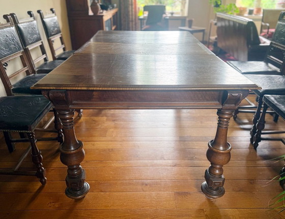 Image 1 of Walnut dining table with 8 chairs