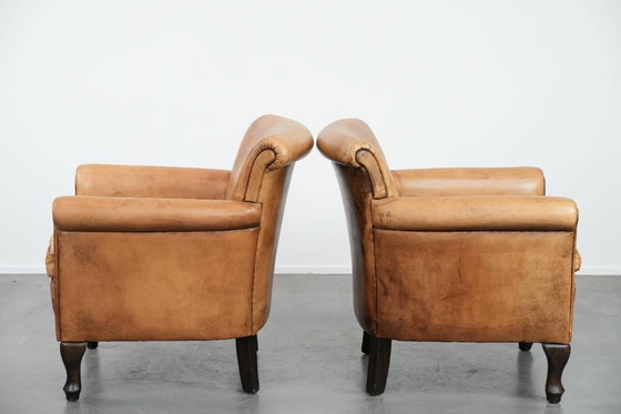 Image 1 of 2 x Subtiele vintage schapenleren fauteuil met een mooie lichte kleur