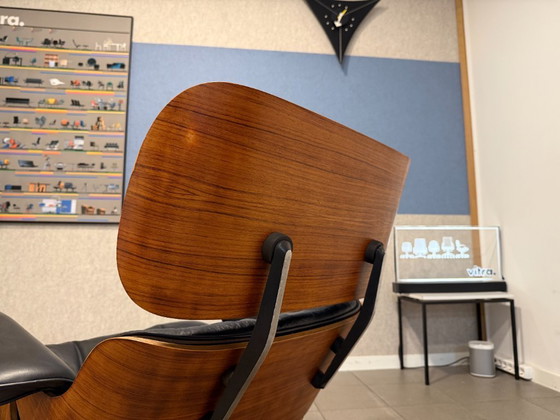 Image 1 of Herman Miller / Contura | Charles & Ray Eames | Lounge Chair & Ottoman | Rosewood & Black Leather | 1x Set
