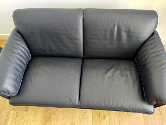 Image 1 of Leolux blue leather two-seater sofa