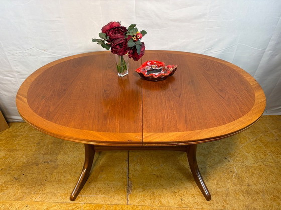 Image 1 of Mid-Century Retro Vintage Teak Extending Dining Table by Nathan 1960s  Seats Up to Six • Stylish & Practical • British Design Cl