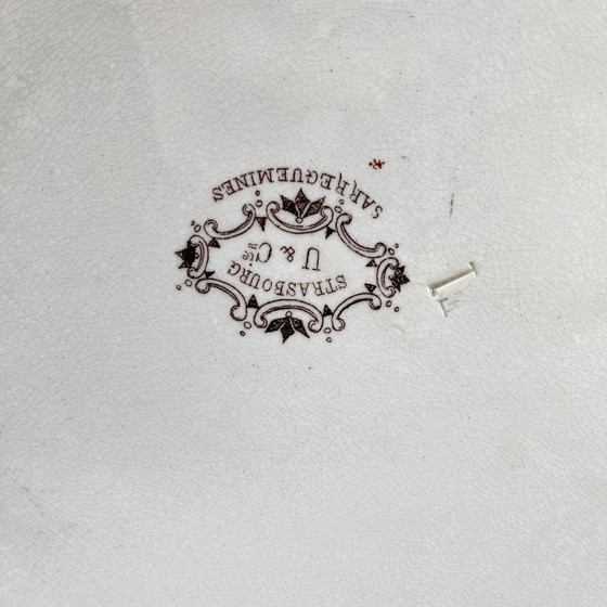 Image 1 of Grand plat rond patiné, modèle Strasbourg, Sarreguemines, 1880-1918