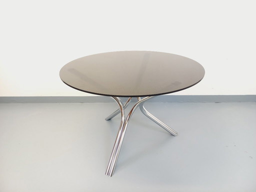 Vintage round dining table in plexiglass, smoked glass type, and chrome-plated metal, Space Age style from the 70s