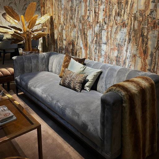 Eichholtz Raffels 2-seater sofa with armchair (set of 2) and ottoman