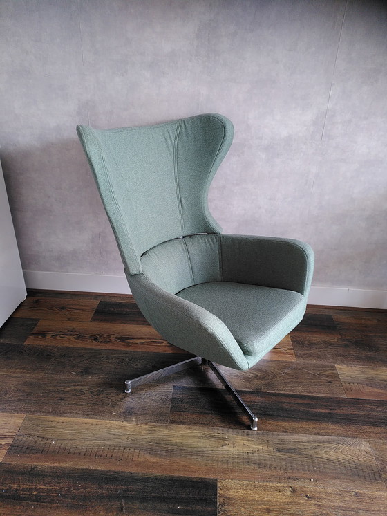 Image 1 of Poltrona con schienale alto Topform e poggiapiedi