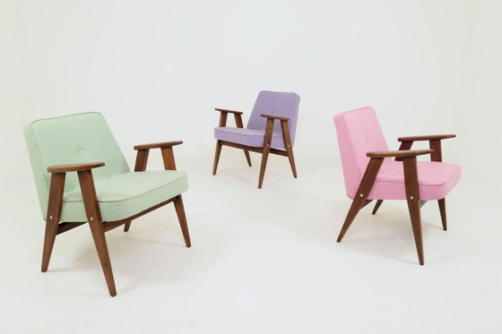 Image 1 of Scandinavische fauteuil met pistachekleurige pastel wollen stof en eikenhout