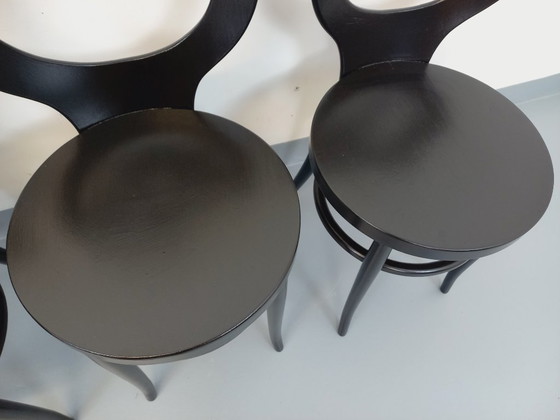 Image 1 of Set van 4 vintage Baumann Mouette stoelen in zwart hout uit de jaren 70.