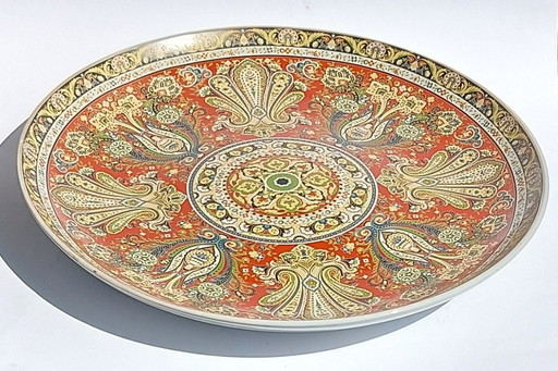 Large Chinese decorative plate with traditional Middle Eastern and Islamic patterns.