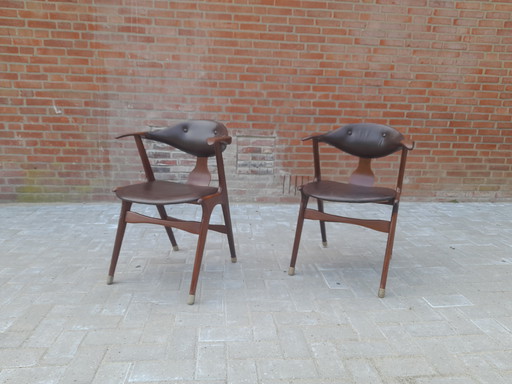 Two louis van Teeffelen cow horn chairs