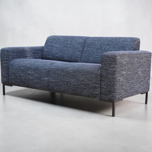 Comfortable two-seater sofa in black white/grey fabric (professionally cleaned)