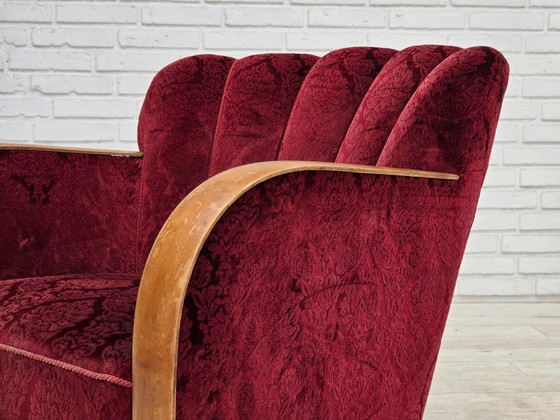 Image 1 of Anni '60, poltrona danese in velluto rosso ciliegia.