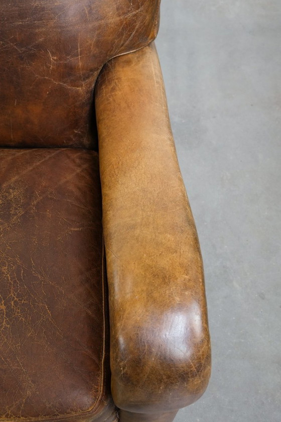 Image 1 of Vintage generfde rundleren fauteuil met ronde vormen