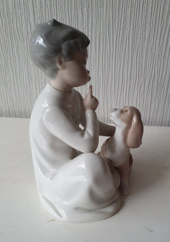Image 1 of Authentic Lladro "Boy with dog" - porcelain figurine 20 cm