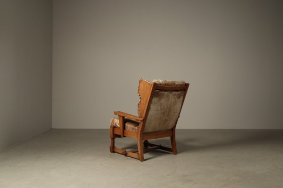 Brutalist oak lounge armchair and ottoman in original goat hide, 1960s – Wood (photo 8 of 15)