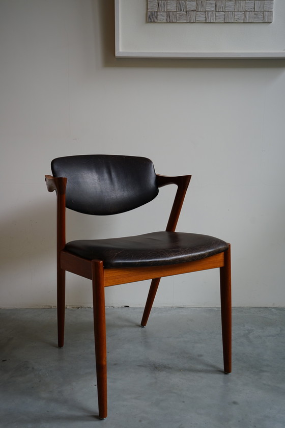 Image 1 of 6 Kai Kristiansen stoelen | Model 42 | Teak Leder patina