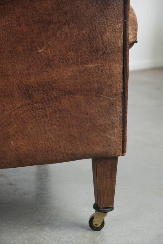 Characterful and comfortable vintage sheepskin armchair with a unique design and a timeless look – Leather (photo 15 of 15)