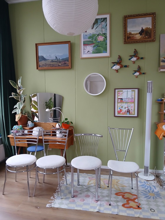 Image 1 of Vier rvs stoelen met boucle stof