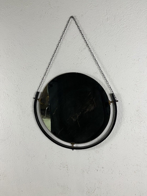 Image 1 of Round varnished metal and brass mirror with chain, 1950s