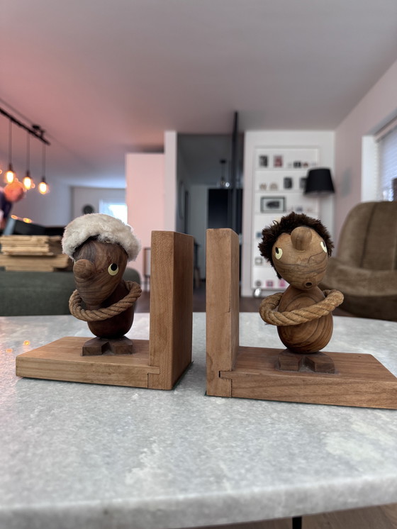 Image 1 of Hans Bolling Deens design boekensteunen Optimist & Pessimist