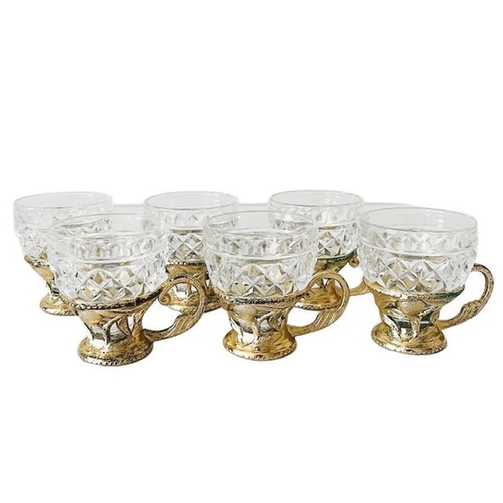 Image 1 of Vintage set of glass coffee cups in gold plastic holder 1970s