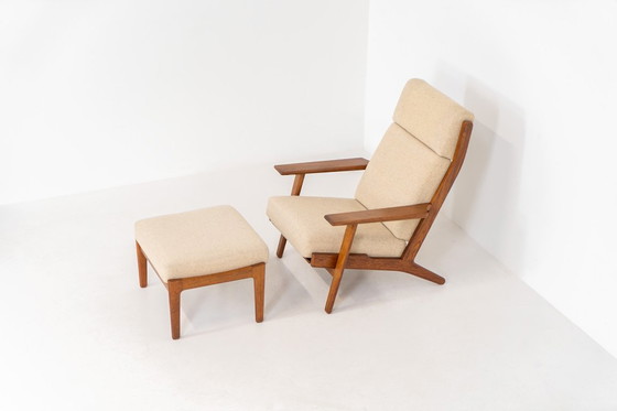 Image 1 of Early GE-290A lounge chair + ottoman in oak by Hans J. Wegner for Getama (Denmark, 1953).