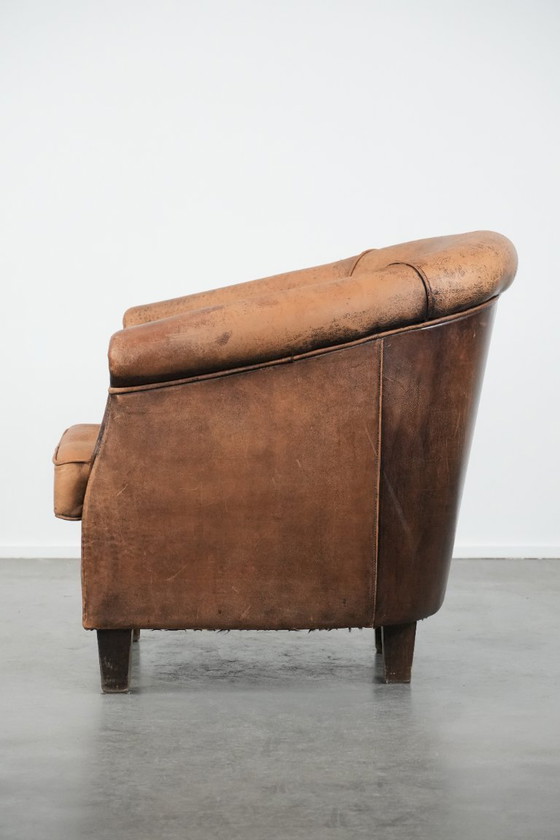 Image 1 of Timeless vintage sheepskin club armchair with character and a beautiful patina