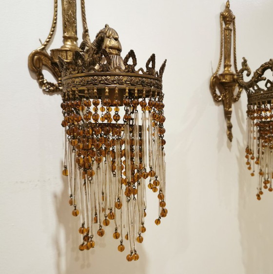 Image 1 of PAIR OF ART NOUVEAU BRASS LAMPS / WALL SCONCES WITH BEADS